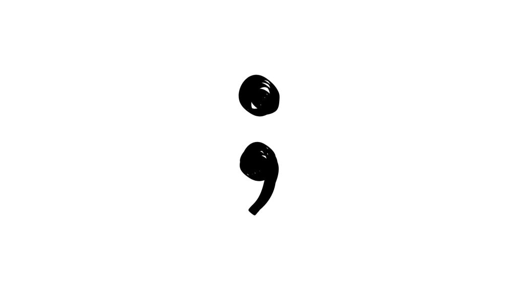An image of a semi-colon.