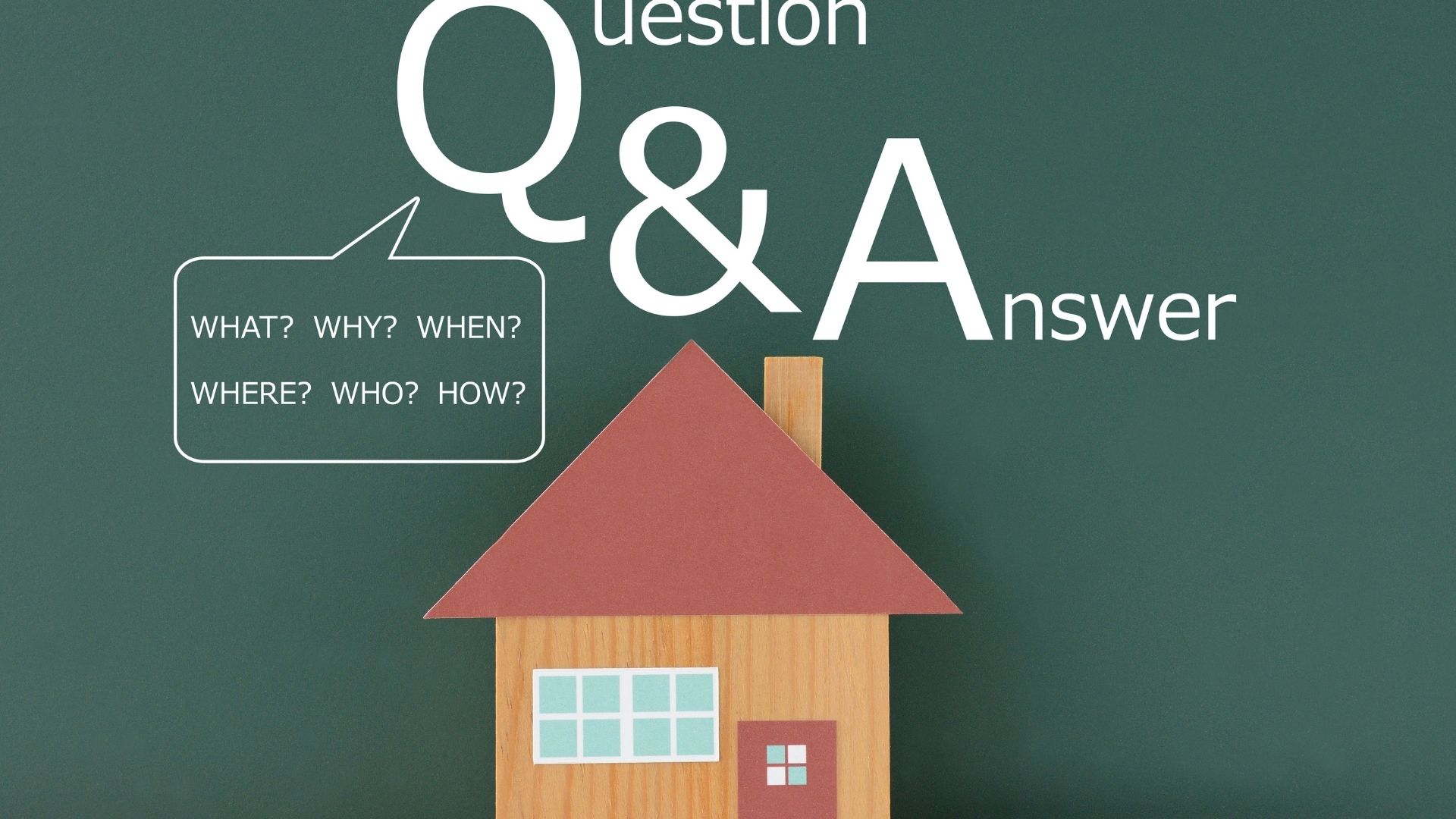 Toy wooden house on a chalkboard with a large Q&A title and a speech bubble of questions (what, why, when, where, who, how).
